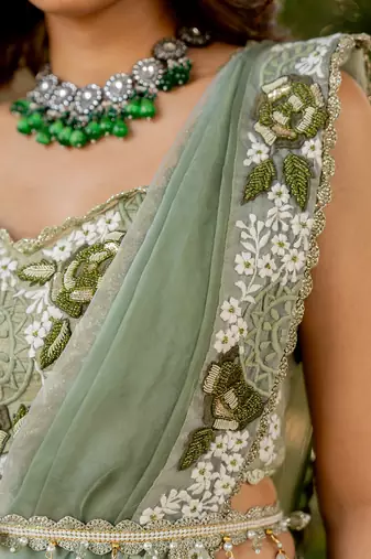 Green raw silk embroidered skirt saree set