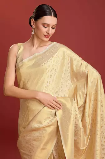 Beige Kanjivaram silk blend zari work saree