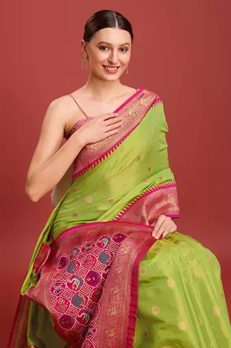 Parrot Green Patola Pallu Tissue silk blend Saree
