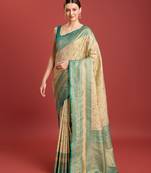 Glamour And Tradition With This Beige Color Zari Woven Faux Banarasi Tissue Silk Blend Saree