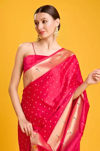 Paithani silk blend saree in bright pink color with gold weaves zari work