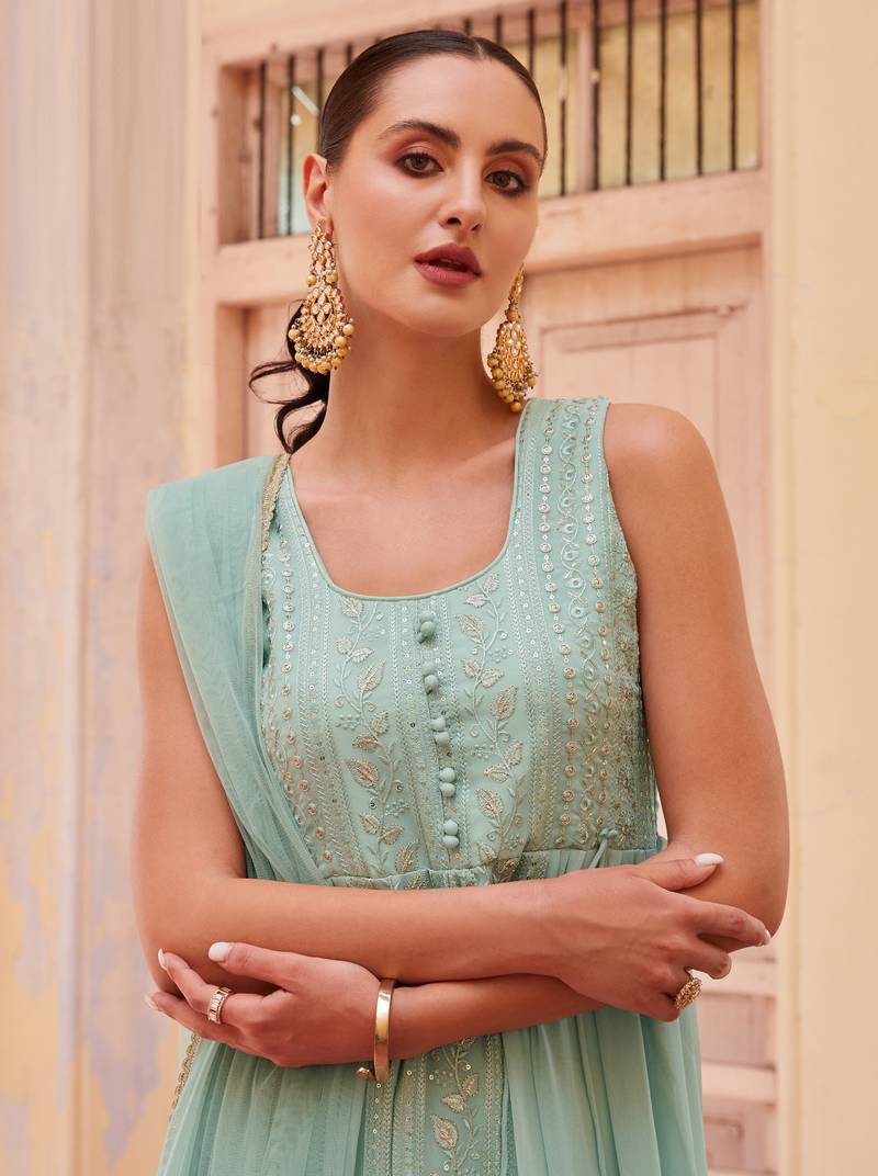 Fascinating Firozi Beautifully Crafted with Embroidered traditional Indian clothing with Western styles
