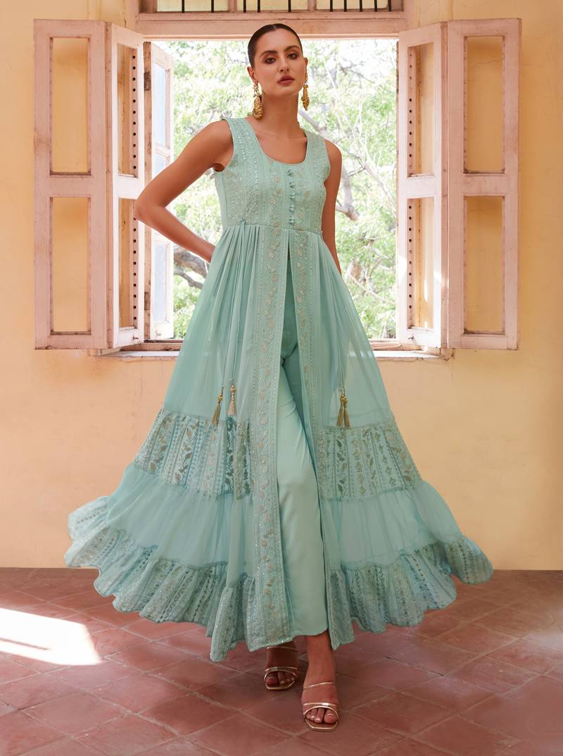 Fascinating Firozi Beautifully Crafted with Embroidered traditional Indian clothing with Western styles