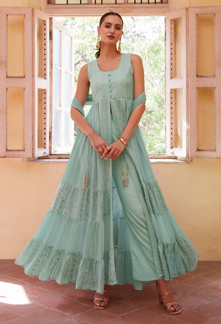 Fascinating Firozi Beautifully Crafted with Embroidered traditional Indian clothing with Western styles