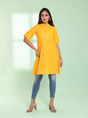 Yellow solid cotton a-line short kurta 1