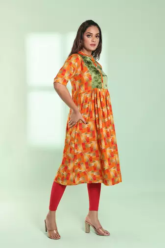 Orange printed gathered rayon kurta with patchwork