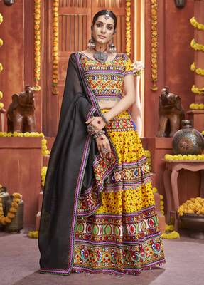 Yellow Colored Gamthi And Mirror Work On Patola Print Mix Cotton Silk Lehenga Choli For Navratri Garba 1