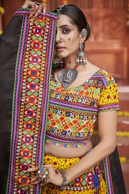 Yellow Colored Gamthi And Mirror Work On Patola Print Mix Cotton Silk Lehenga Choli For Navratri Garba 2