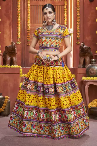 Yellow Colored Gamthi And Mirror Work On Patola Print Mix Cotton Silk Lehenga Choli For Navratri Garba