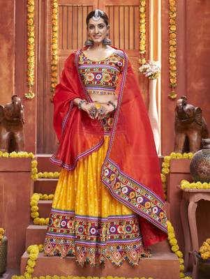 Yellow Gamthi And Mirror Work On Patola Print Mix Cotton Silk Lehenga Choli For Navratri Garba 1