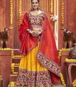 Yellow Gamthi And Mirror Work On Patola Print Mix Cotton Silk Lehenga Choli For Navratri Garba