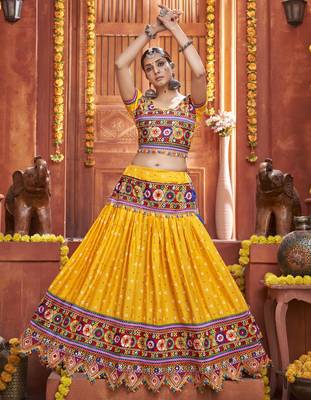 Yellow Gamthi And Mirror Work On Patola Print Mix Cotton Silk Lehenga Choli For Navratri Garba 2