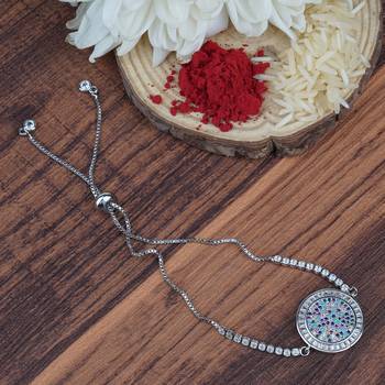Rhodium plated american diamond zircon red and blue rakhi bracelet 1