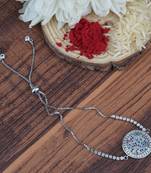 Rhodium plated american diamond zircon red and blue rakhi bracelet