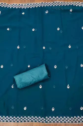 Teal colour with embroidered work georgette semi stitched dress with unstitched bottom