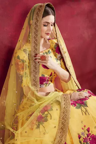 CAPTIVATING YELLOW PEARL, DORI AND SEQUINS EMBROIDERED ART SILK SEMI STITCHED PARTY WEAR LEHENGA CHOLI