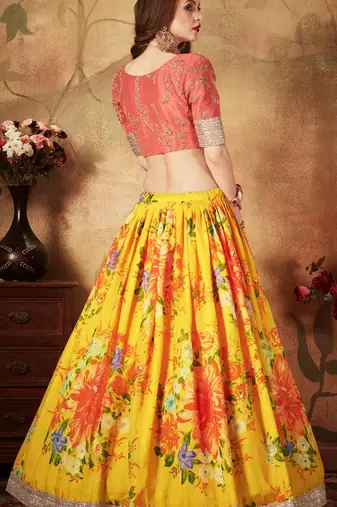 YELLOW & ORANGE  COLORED DORI, ZARI, AND SEQUINS EMBROIDERED & DIGITAL FLORAL PRINTED ORGANZA PARTY WEAR LEHENGA