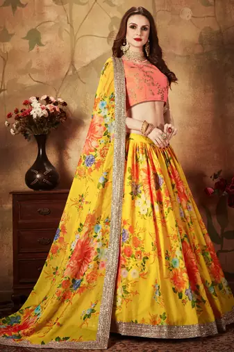 YELLOW & ORANGE  COLORED DORI, ZARI, AND SEQUINS EMBROIDERED & DIGITAL FLORAL PRINTED ORGANZA PARTY WEAR LEHENGA