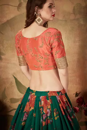 GREEN & ORANGE COLORED DORI, ZARI, AND SEQUINS EMBROIDERED & DIGITAL FLORAL PRINTED ORGANZA WEDDING LEHENGA CHOLI