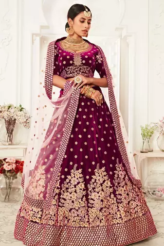 ENGAGING PURPLE ZARI, SEQUINS AND THREAD EMBROIDERED VELVET FABRIC LEHENGA CHOLI FOR DULHAN