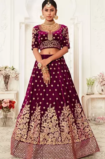 ENGAGING PURPLE ZARI, SEQUINS AND THREAD EMBROIDERED VELVET FABRIC LEHENGA CHOLI FOR DULHAN