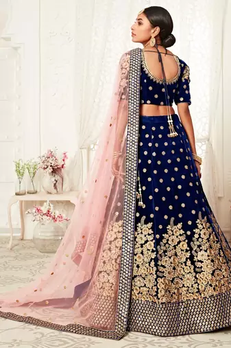 ALLURING NAVY-BLUE ZARI, SEQUINS AND THREAD EMBROIDERED VELVET FABRIC LEHENGA CHOLI FOR BRIDAL