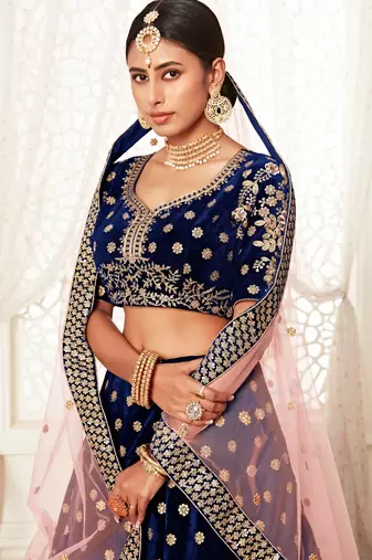 ALLURING NAVY-BLUE ZARI, SEQUINS AND THREAD EMBROIDERED VELVET FABRIC LEHENGA CHOLI FOR BRIDAL