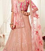HYPNOTIZING PINK ZARI, SEQUINS AND THREAD EMBROIDERED DESIGNER NET FABRIC LEHENGA CHOLI