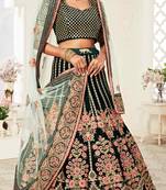 DELIGHTFUL DARK GREEN ZARI, SEQUINS AND THREAD EMBROIDERED VELVET FABRIC LEHENGA CHOLI FOR WEDDING