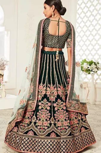DELIGHTFUL DARK GREEN ZARI, SEQUINS AND THREAD EMBROIDERED VELVET FABRIC LEHENGA CHOLI FOR WEDDING