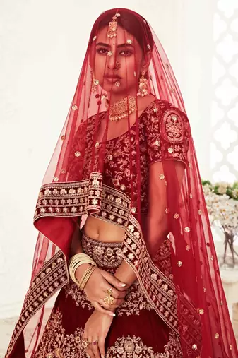 MESMERIZING DARK RED ZARI, SEQUINS AND THREAD EMBROIDERED VELVET FABRIC LEHENGA CHOLI FOR WEDDING