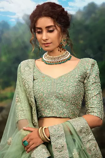 GREEN SEQUINS AND DORI EMBROIDERED SOFT NET FESTIVE & PARTY WEAR SEMI STITCHED LEHENGA