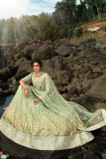 GREEN SEQUINS AND DORI EMBROIDERED SOFT NET FESTIVE & PARTY WEAR SEMI STITCHED LEHENGA