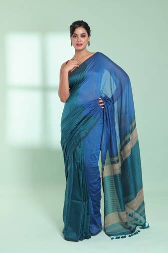 Teal blue patli pallu cotton saree with texture design