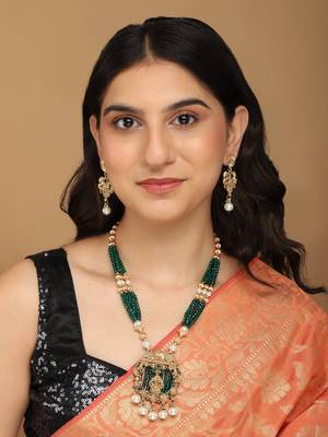 Mansiyaorange dark green matte gold temple theme maa lakshmi motif necklace set with earrings 1