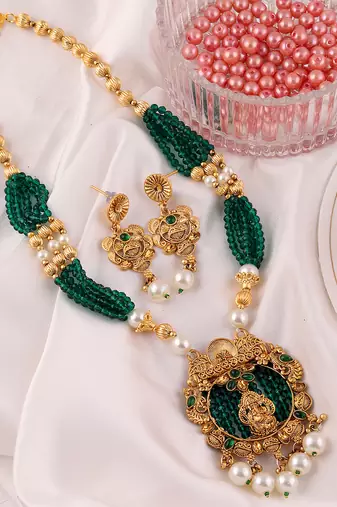 Mansiyaorange dark green matte gold temple theme maa lakshmi motif necklace set with earrings