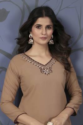 Beige colour hand work with pocket kurti on cotton fabric for formal looks 2