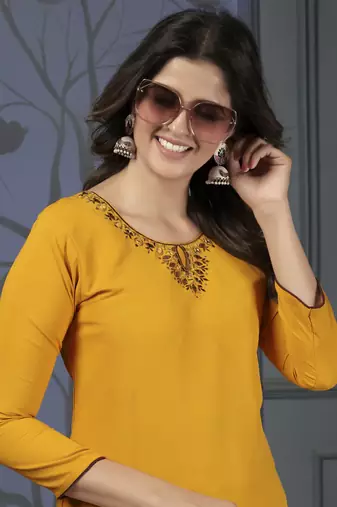 Yellow colour hand with pocket kurti on cotton for formal looks