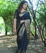 Black sophisticated kanjivaram silk traditionally rich woven saree with bandhej print