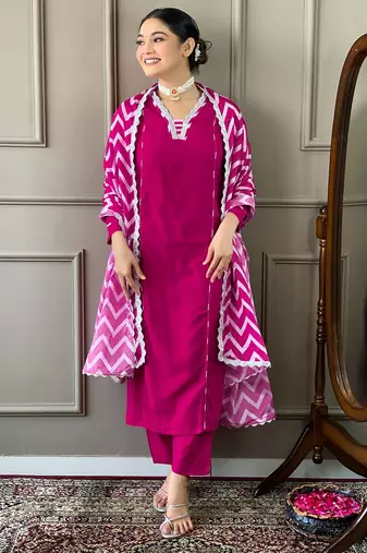 Gajri colour viscosee fabric printed and embroidered partywear suit