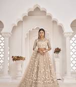 Women's Dusty Chiqu Butterfly Net White Cotton Thread And Zari Sequence Embroidered Work Lehenga Choli For Party Wear