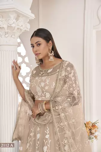 Women's Dusty Chiqu Butterfly Net White Cotton Thread And Zari Sequence Embroidered Work Lehenga Choli For Party Wear