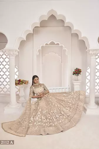Women's Dusty Chiqu Butterfly Net White Cotton Thread And Zari Sequence Embroidered Work Lehenga Choli For Party Wear