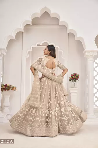Women's Dusty Chiqu Butterfly Net White Cotton Thread And Zari Sequence Embroidered Work Lehenga Choli For Party Wear