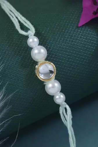 designer kundan pearl rakhi with roli chawal & rakshabandhan card for brother