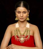 White necklace with earrings and tika