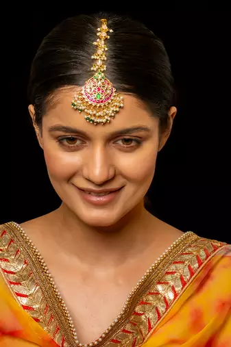 Multi coloured maang tika