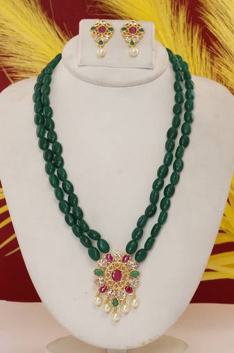 Cz stone studded pendant set with semi precious beads