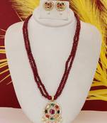 Cz stone studded pendant set with semi precious beads