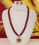 Cz stone studded pendant set with semi precious beads